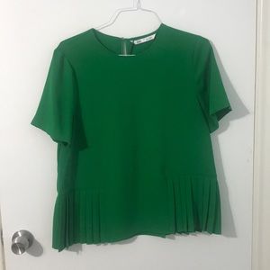 Green pleated blouse